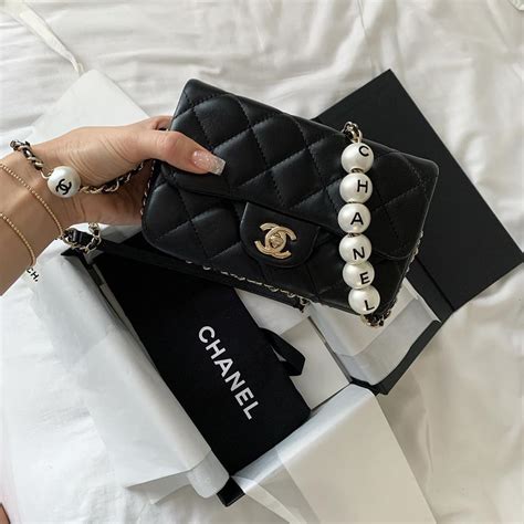 chanel handbag with gold chain|chanel bag with pearl chain.